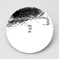 Handmade sterling silver Shagreen pattern brooch featuring a 10mm Amber stone