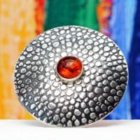 Handmade sterling silver Shagreen pattern brooch featuring a 10mm Amber stone