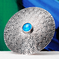 Handmade sterling silver Swirl pattern brooch featuring a beautiful 8mm blue Opal gemstone