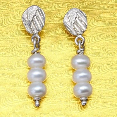 Pearl drop earrings, three freshwater pearl earrings.