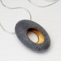 Pebble pendant with sterling silver chain, 'Hollow'