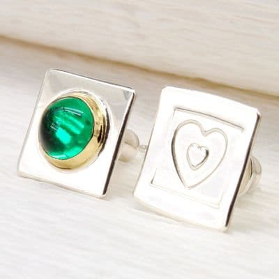 Small silver Asymmertrical ear studs  featuring a green Spinel gemstone.