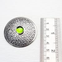 Squiggle pattern handmade brooch, sterling silver and a beautiful Peridot gemstone