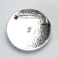 Squiggle pattern handmade brooch, sterling silver and a beautiful Peridot gemstone