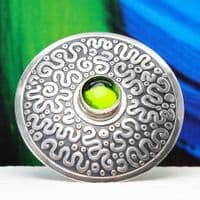 Squiggle pattern handmade brooch, sterling silver and a beautiful Peridot gemstone
