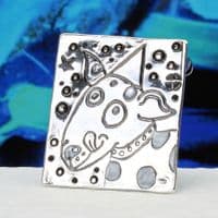Sterling silver dog brooch, terrier dog with a hat