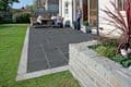 LIMESTONE PAVING (BLACK) RIVEN (PACK 18.28SQM) (SPLIT EDGES)