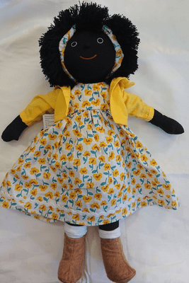 Leah, 38 cm dark skinned doll in floral dress. Mel & Steff