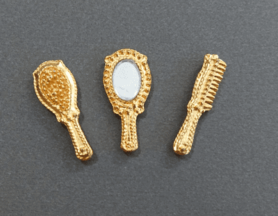 Miniature brush, comb & mirror set.  Heidi Ott