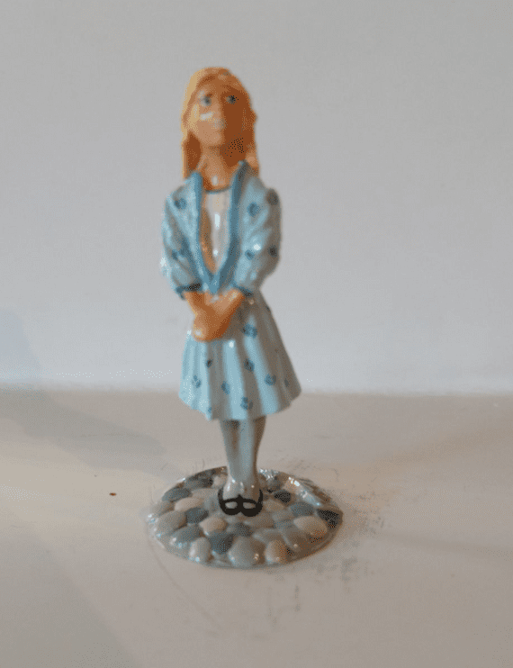 Minnie Maria. Standing Pewter Alice from Alice in Wonderland.