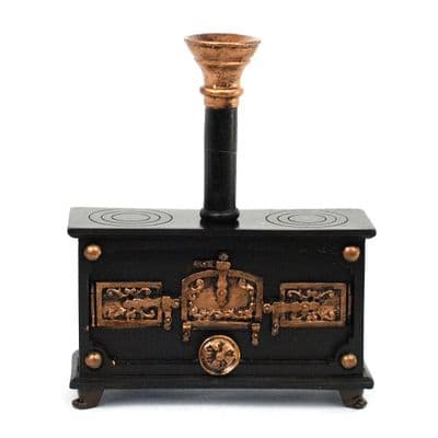 Reutter, Black and copper resin dolls house stove.
