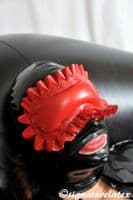 Latex padded blindfold with frill and latex tie back