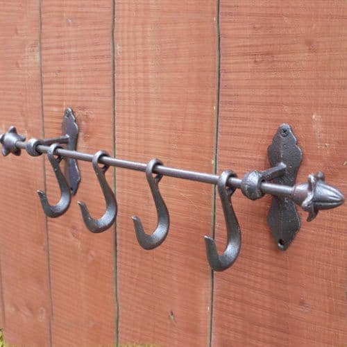 Four Metal Hooks on Bar | The Sign Maker Shop
