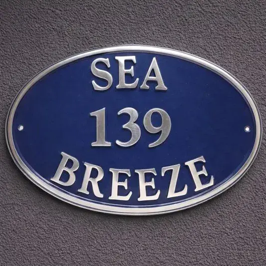 Oval Shape Cast Aluminium Sign - Polished Curved Text