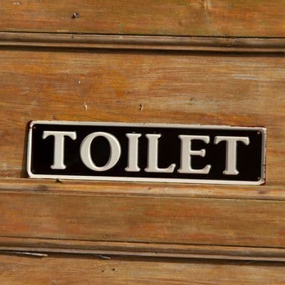 Vintage Embosed Metal Toilet Sign