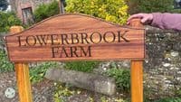 Wooden Sign with Arch Top Morticed into Posts | The Sign Maker