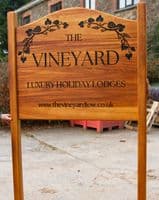Wooden Sign with Arch Top Morticed into Posts | The Sign Maker