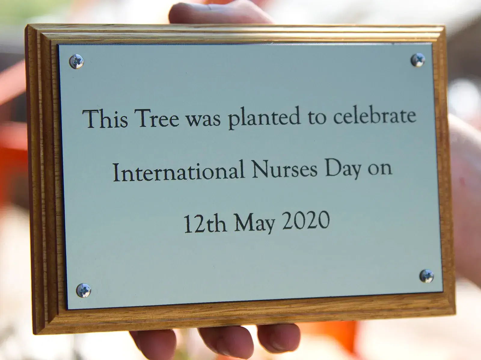 Engrave plaque on a backing board