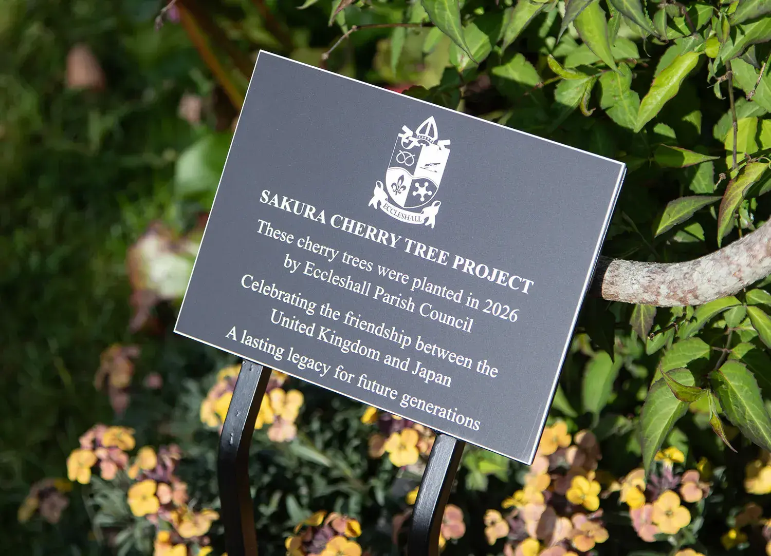 Plaque on wrought iron tree stake