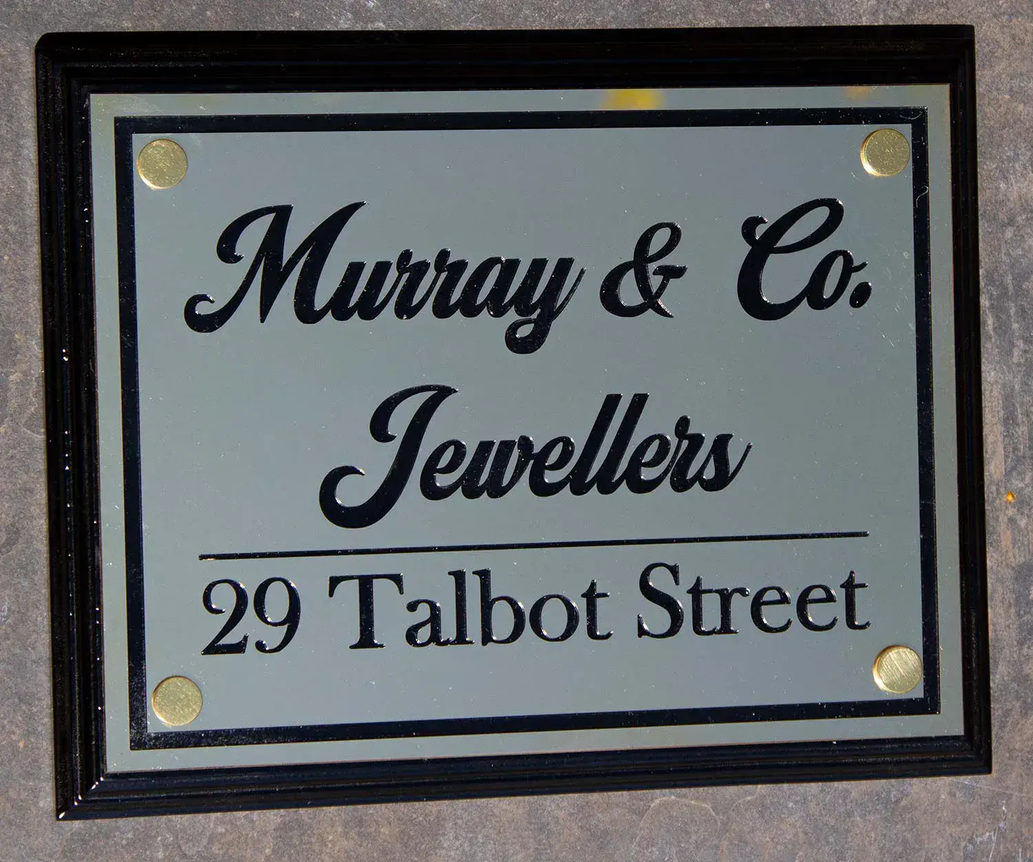 Brass Plaque on Black Backing Board