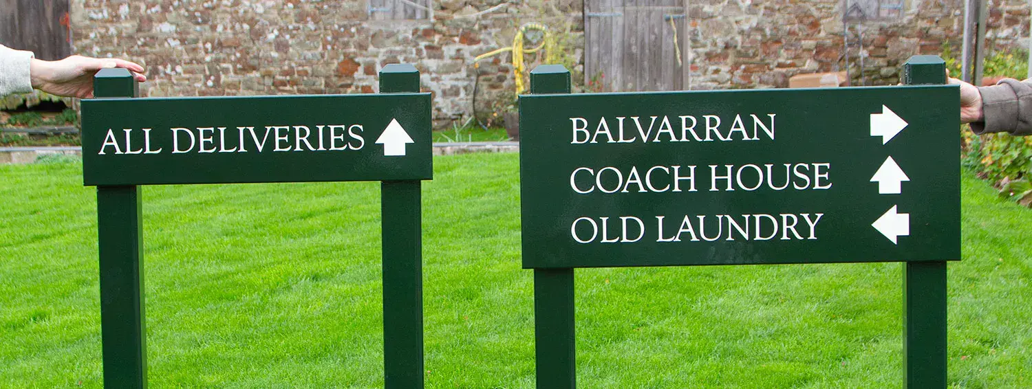 Painted signs on posts