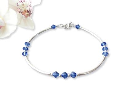 Sapphire Blue Crystals & Sterling Silver Curves Designer Bracelet