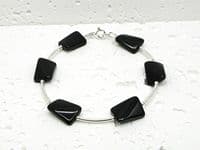Twisted Black Onyx Oblong Beads Bracelet With Sterling Silver Curved Tubes | Natural Semi Precious Gemstones Bracelet | Silver Sensations