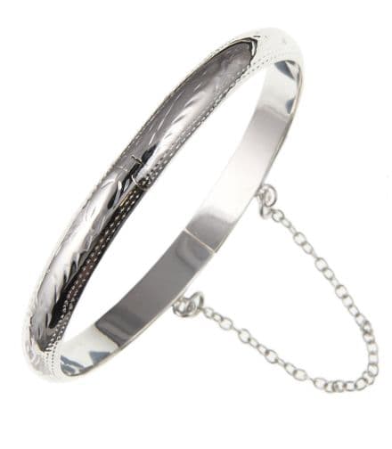 Fancy Opening Silver bangle - child or Teenage size.