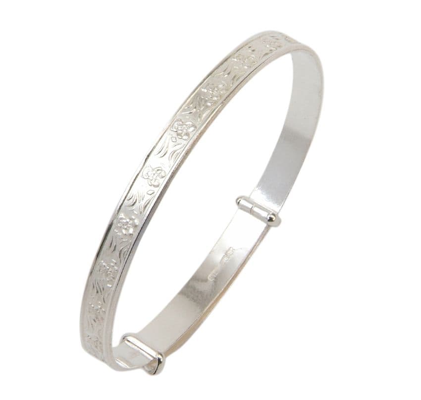 Sterling Silver Childrens Bangle with Seated Teddy Design.