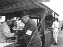 Alfred Neubauer (Mercedes Team Manager)  1937 Donington GP pits