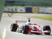ALLAN McNISH Signed on TOYOTA F1 action photo(10x8)