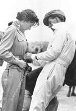 Doreen Evans with brother K D Evans(?) Brooklands paddock - Maybe 1935 BRDC 500.