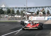 Ferrari 312T4 Gilles Villeneuve & Williams Fw07 Alan Jones. Photo Canadian GP 1979.
