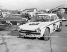 Ford Cortina V8 "Fraud Cortina" Terry Sanger or Terry Drury Silverstone paddock c.1967