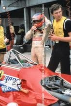 Gilles Villeneuve. Photo. Stood by Ferrari 126C Turbo . Brazil GP pits 1982