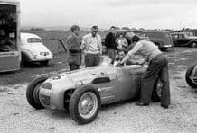 HWM Stirling Moss in the paddock Goodwood 1950