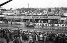 Jaguar D Type. Mike Hawthorn exiting pits Le Mans 1955 (1st)