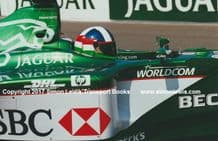 JAGUAR R1 F1 Dario Franchitti side close up testing at Silverstone 2000 . Photo