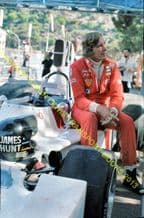 JAMES HUNT sat on Hesketh 308B F1 Monaco GP pit photo 1975 10x7"