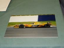 JORDAN 199 Damon Hill Silverstone. 12x8" action photo (a)