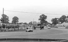 Lotus 11 at speed at Woodcote, Silverstone c.1956