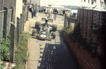 Lotus 72 JPS Ickx car Brands paddock tunnel 1974 (b)