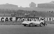 Lotus VIII being pushed along at Silverstone c.1955