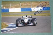 McLaren MP4/15. David Coulthard SIGNED 6x4". photo . Silverstone 2000