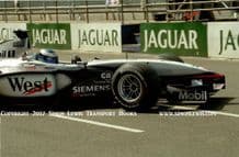 McLaren MP4/16 Mercedes. Mikka Hakkinen . Silvertone pit lane. Testing 2001 (b)