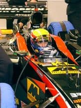 Minari PS02 Asiatech F1 Mark Webber. Silverstone pit garage 2002