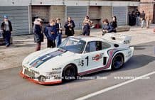 PORSCHE 935-77 Group 5. Photo. Mass/Ickx car in pit lane before Silverstone 6 Hours 1977 (a)