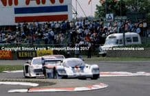 Porsche 956 . Jacky Ickx at speed leads Lancia Beta.  Silverstone 6 Hours Group C 1982