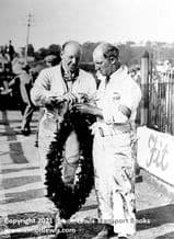 ROY ECCLES with winner's garland Brooklands paddock Sept 13 1933