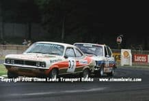 Vauxhall  Magnum(Holman Blackburn) & BMW(Walkinshaw) Photo. RAC Saloons. Donington 1977